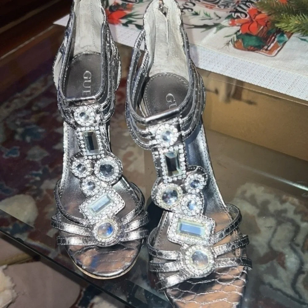 Guess heels about to 4inches, big rhinestones , bright and shiny